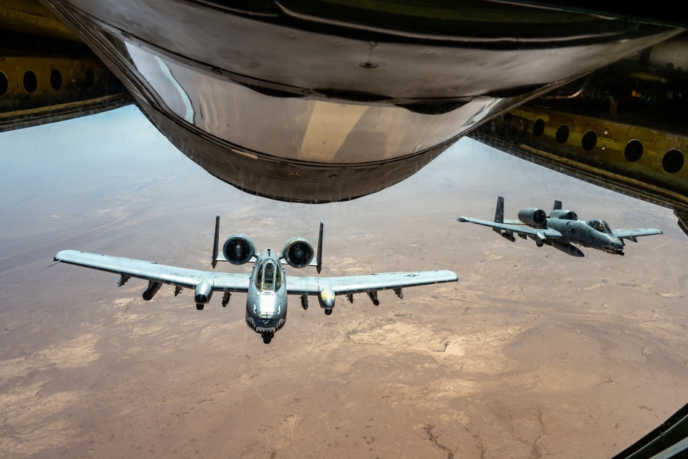KC-135 Conducts refueling operations with A-10s