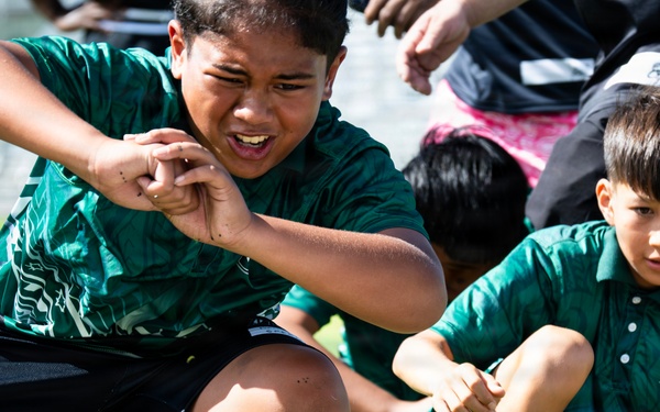 94th Army Air and Missile Defense Command Soldiers volunteer at the Youth Impact Program