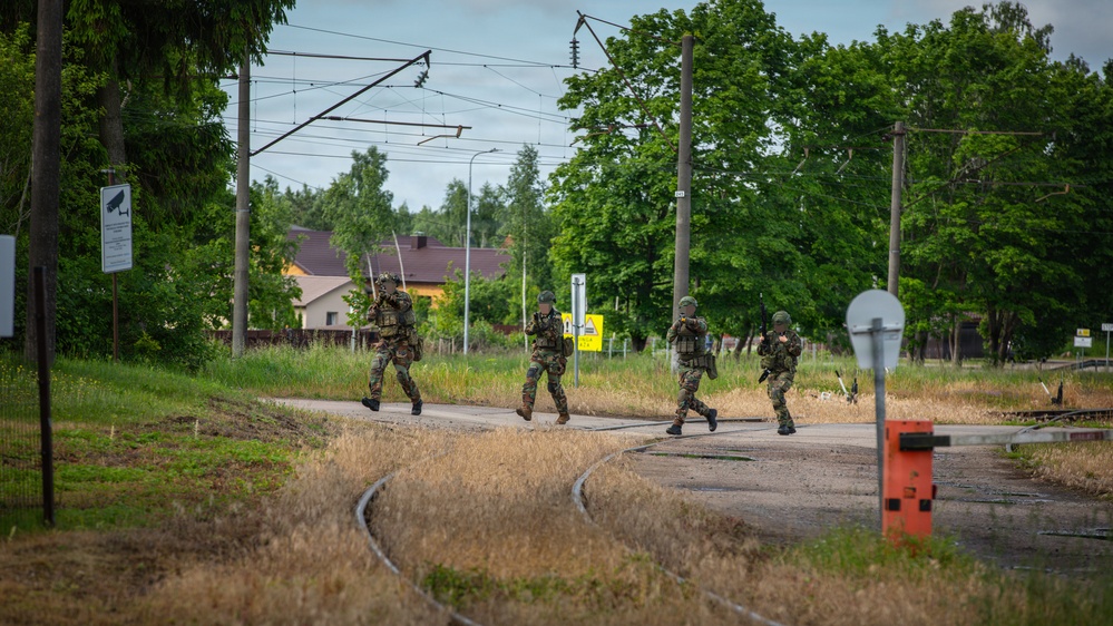 Lithuanian Riflemen's Union perform Validation Exercise after nine weeks of training with U.S. Forces