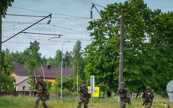 Lithuanian Riflemen's Union perform Validation Exercise after nine weeks of training with U.S. Forces