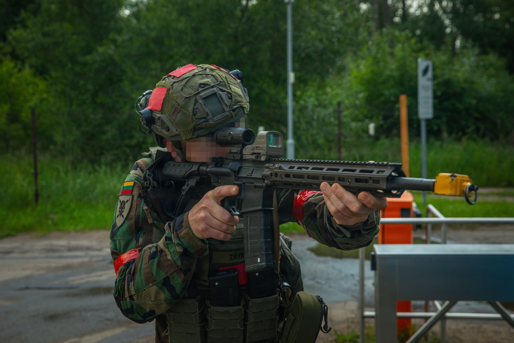 Lithuanian Riflemen's Union perform Validation Exercise after nine weeks of training with U.S. Forces