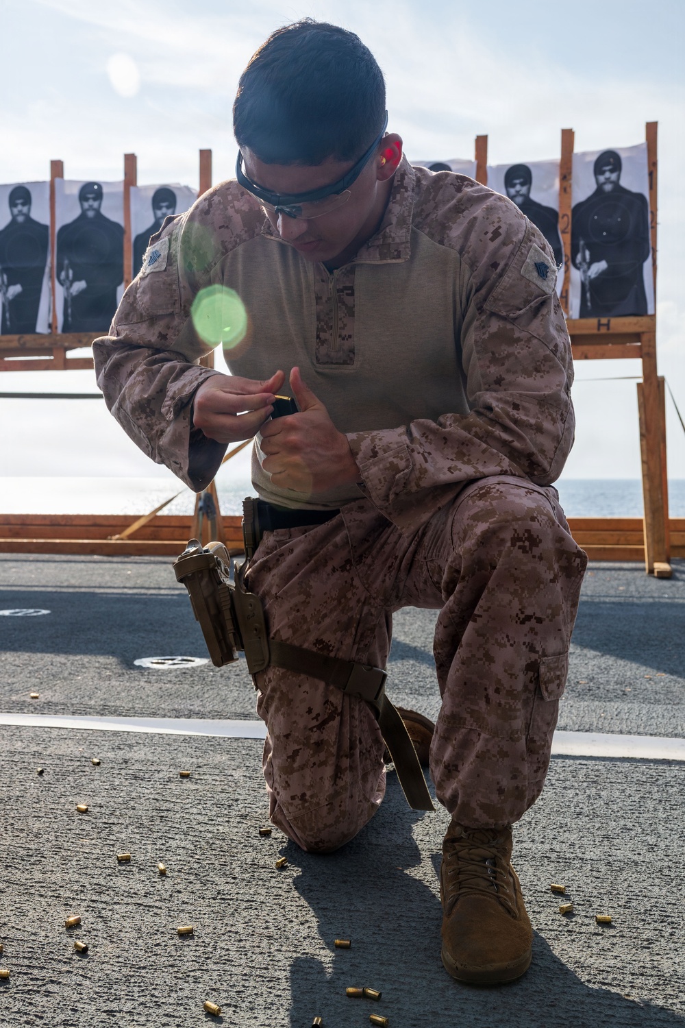 11th MEU Marines Conduct A Pistol Range Aboard USS Boxer