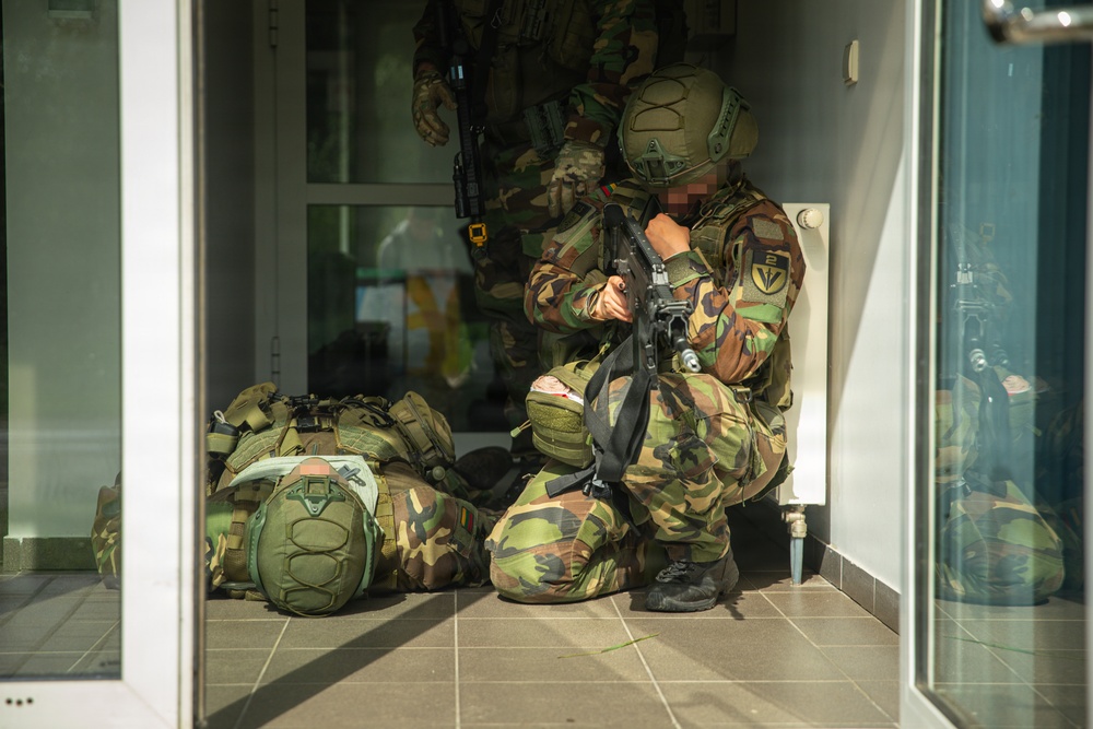 Lithuanian Riflemen's Union perform Validation Exercise after nine weeks of training with U.S. Forces