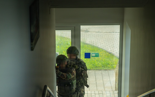 Lithuanian Riflemen's Union perform Validation Exercise after nine weeks of training with U.S. Forces