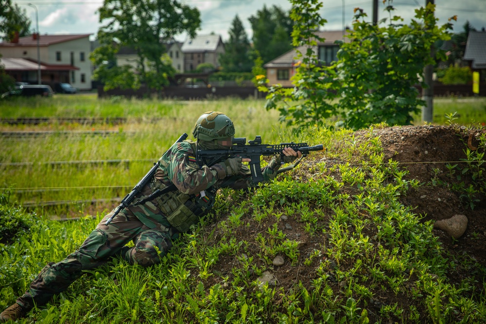 Lithuanian Riflemen's Union perform Validation Exercise after nine weeks of training with U.S. Forces