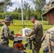 U.S. Marines and Latvian soldiers conduct a decontamination zone in the Baltic region