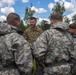 U.S. Marines and Latvian soldiers conduct a decontamination zone in the Baltic region