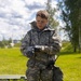 U.S. Marines and Latvian soldiers conduct a decontamination zone in the Baltic region
