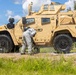 U.S. Marines and Latvian soldiers conduct a decontamination zone in the Baltic region