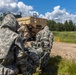 U.S. Marines and Latvian soldiers conduct a decontamination zone in the Baltic region