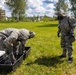 U.S. Marines and Latvian soldiers conduct a decontamination zone in the Baltic region