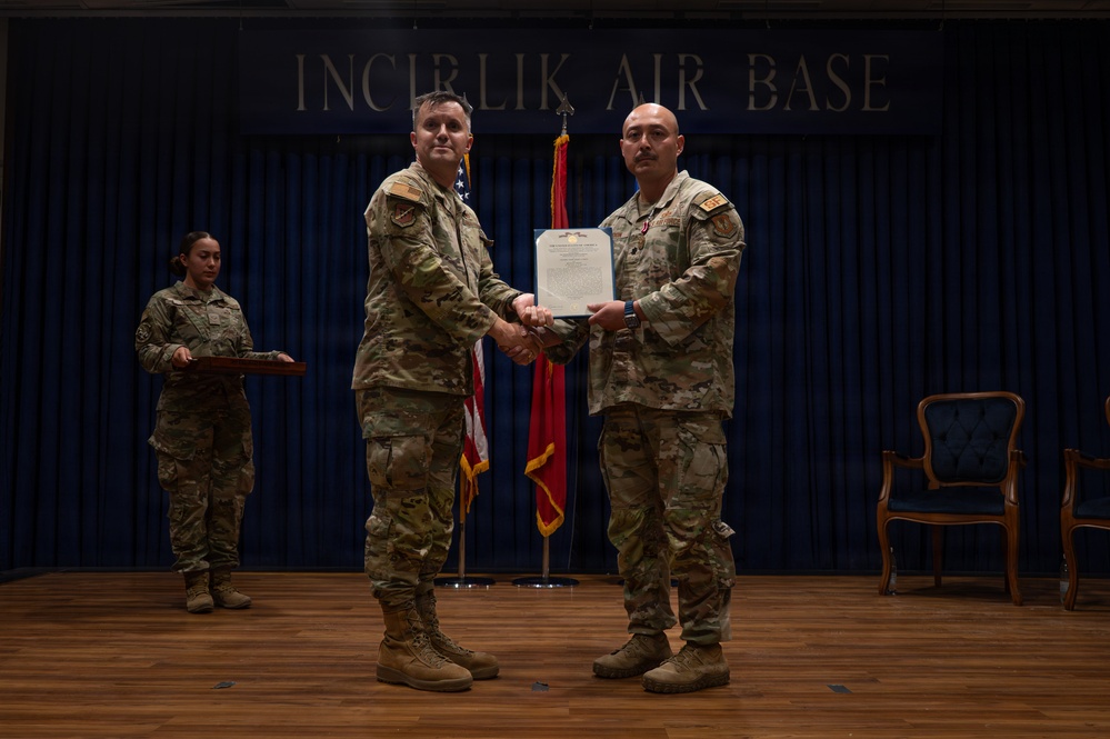 Maj. Anthony Langdon is awarded the Meritorious Service Medal