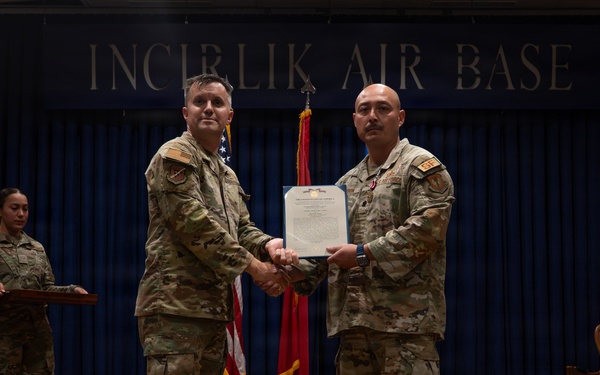 Maj. Anthony Langdon is awarded the Meritorious Service Medal