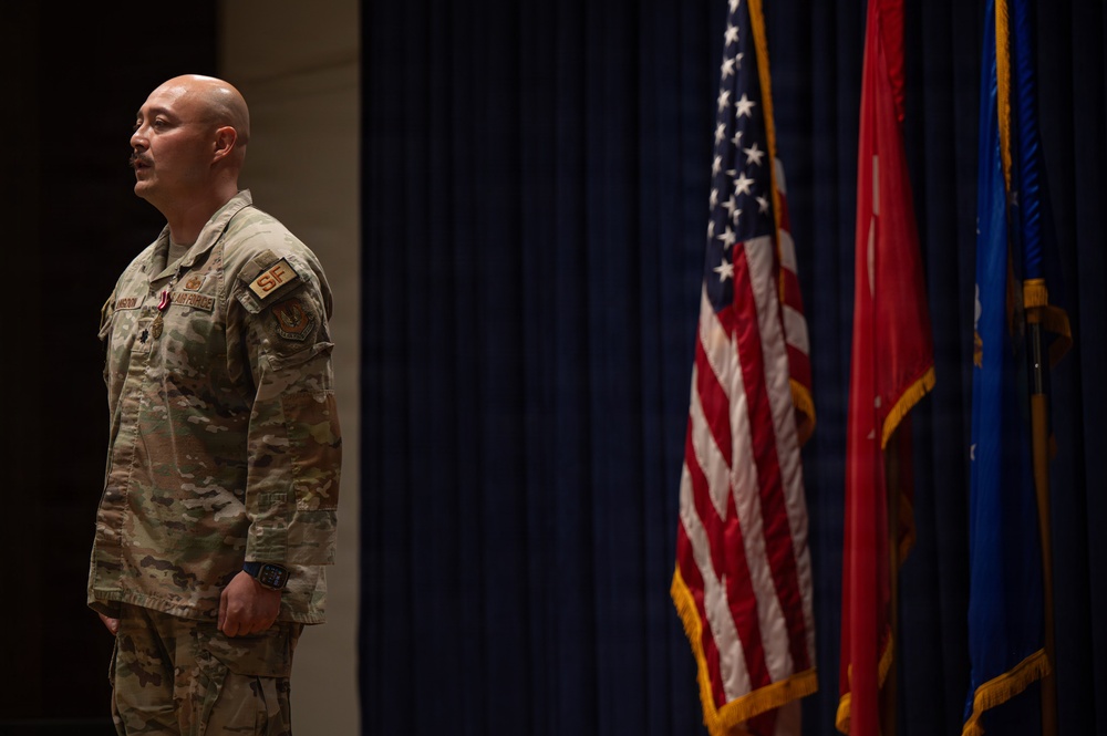 Maj. Anthony Langdon is awarded the Meritorious Service Medal