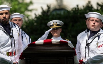 Military Funeral Honors are Conducted for U.S. Navy Radioman Petty Officer 1st Class Louis Rine at U.S. Soldiers' and Airmen's Home National Cemetery