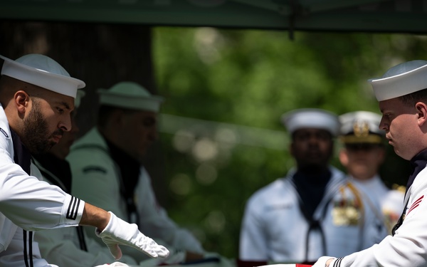 Military Funeral Honors are Conducted for U.S. Navy Radioman Petty Officer 1st Class Louis Rine at U.S. Soldiers' and Airmen's Home National Cemetery