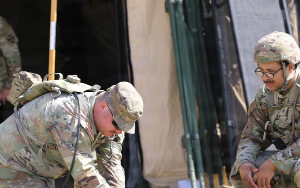 624th Forward Resuscitative Surgical Detachment (FRSD) performs medical field training using a robotic canine