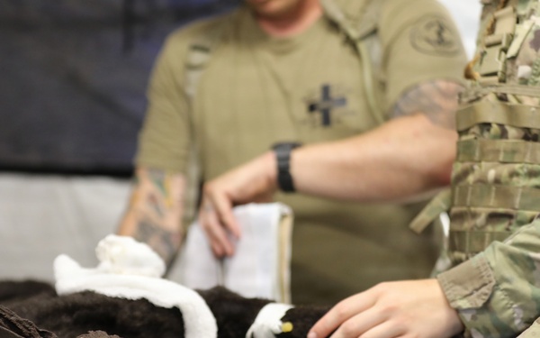 624th Forward Resuscitative Surgical Detachment (FRSD) performs medical field training using a robotic canine