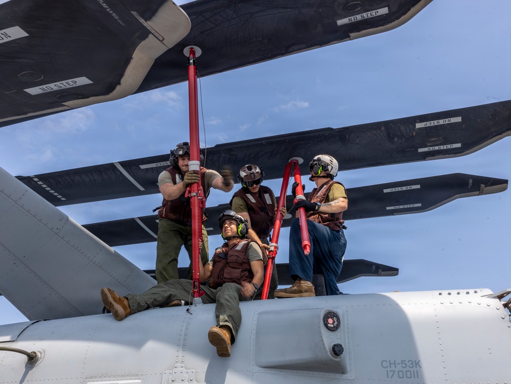 26th Marine Expeditionary Unit’s Type Commanders Amphibious Training | HMH-461 conduct maintenance aboard the USS Arlington