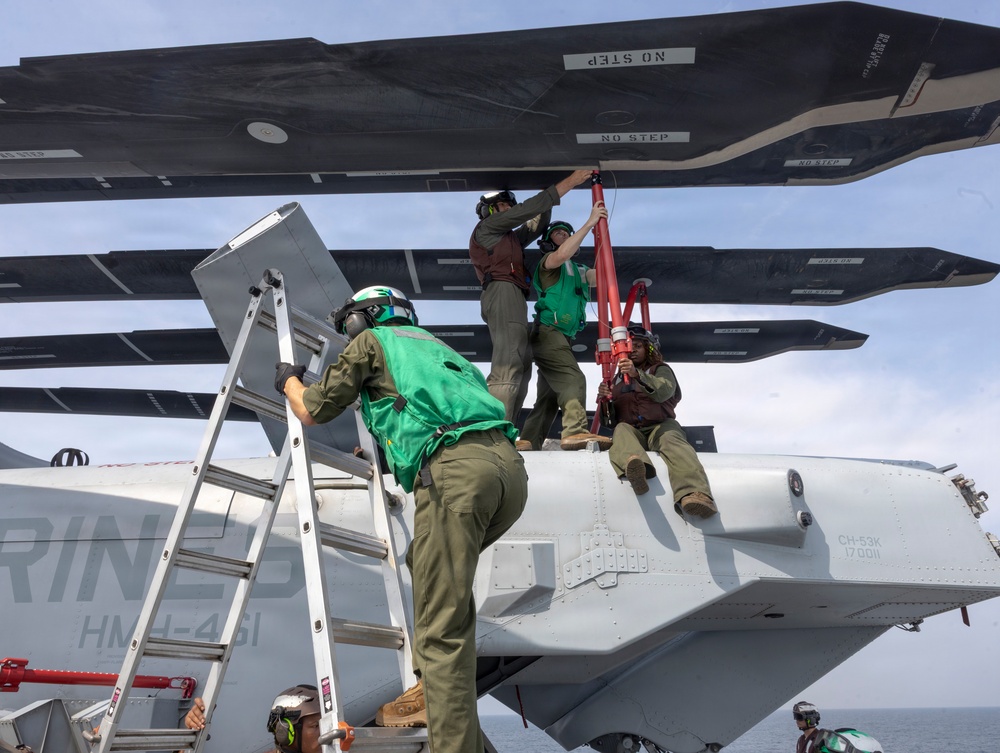 26th Marine Expeditionary Unit’s Type Commanders Amphibious Training | HMH-461 conduct maintenance aboard the USS Arlington