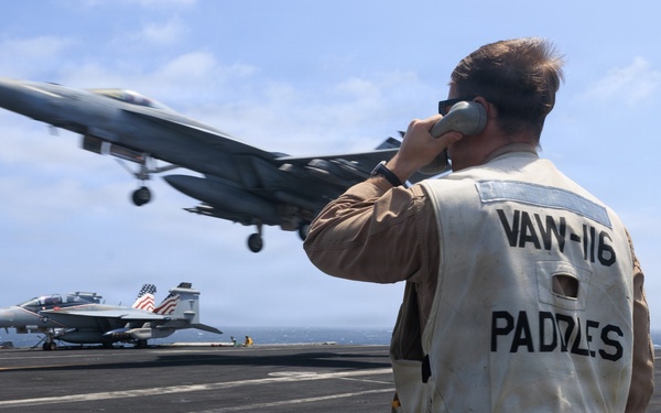 USS George H.W. Bush signal aircraft for landing
