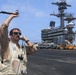 USS George H.W. Bush signal aircraft for landing