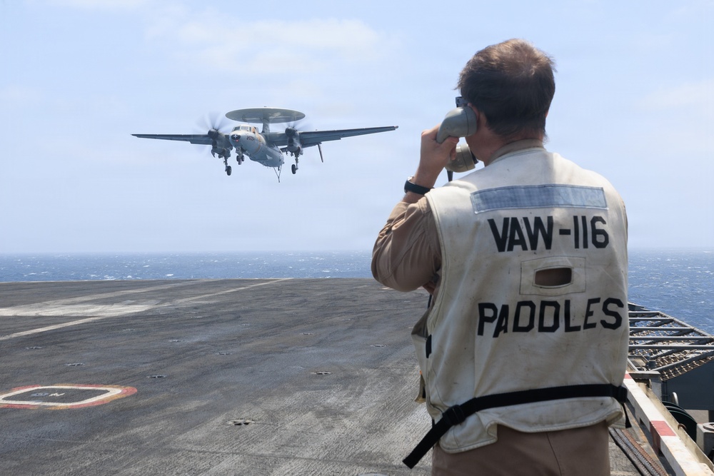 USS George H.W. Bush signal aircraft for landing