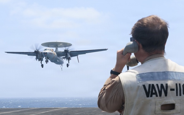 USS George H.W. Bush signal aircraft for landing