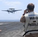 USS George H.W. Bush signal aircraft for landing