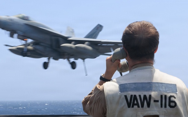 USS George H.W. Bush signal aircraft for landing