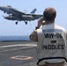 USS George H.W. Bush signal aircraft for landing