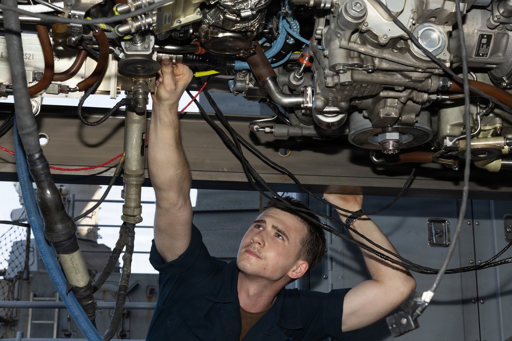 USS George H.W. Bush maintains a jet engine