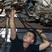 USS George H.W. Bush maintains a jet engine