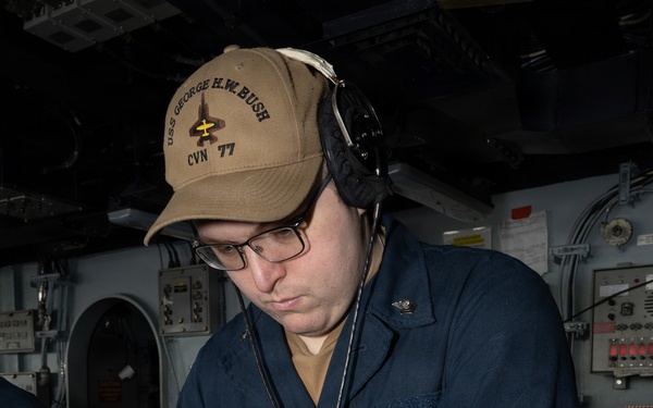 USS George H.W. Bush Sailor stands watch