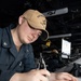 USS George H.W. Bush Sailor references a chart