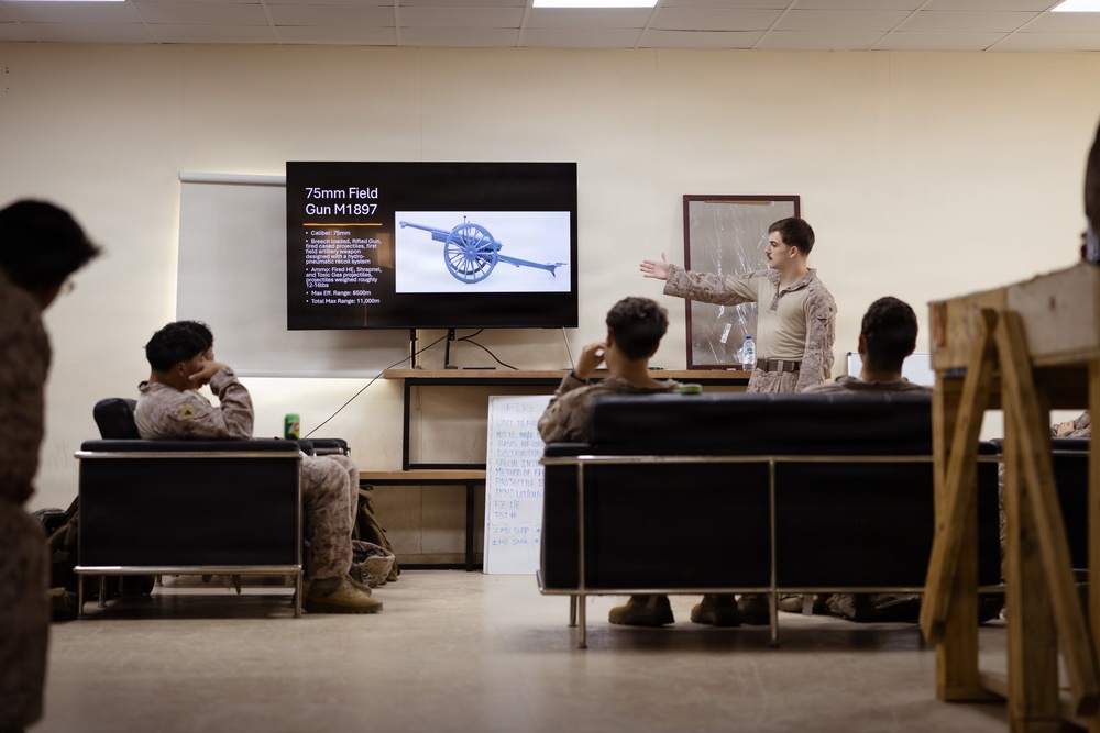 U.S. Marines and Sailors Attend a Marine Corps Artillery History Class