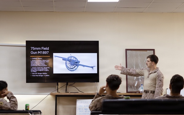 U.S. Marines and Sailors Attend a Marine Corps Artillery History Class