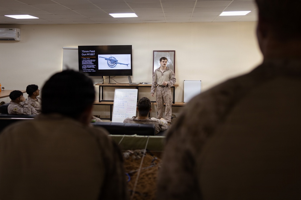 U.S. Marines and Sailors Attend a Marine Corps Artillery History Class