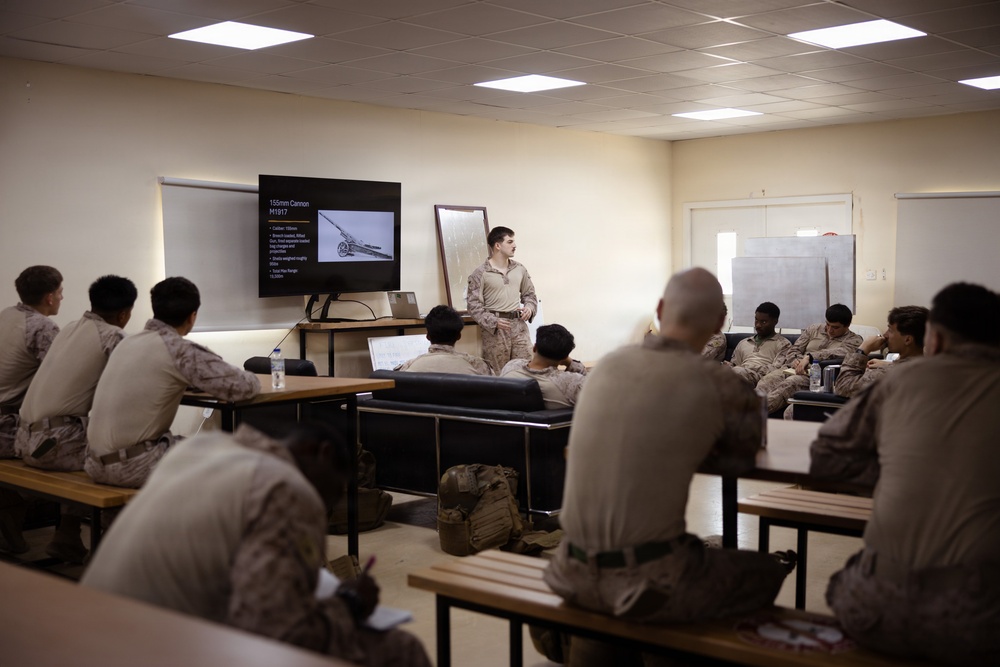 U.S. Marines and Sailors Attend a Marine Corps Artillery History Class