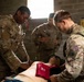 U.S. and British Army medics train together during close-quarters battle drills
