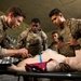 U.S. and British Army medics train together during close-quarters battle drills