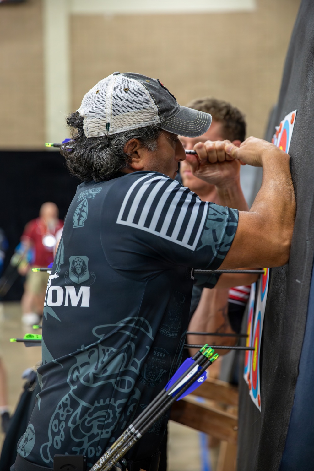 SOCOM Competitor Removes an Arrow From a Target