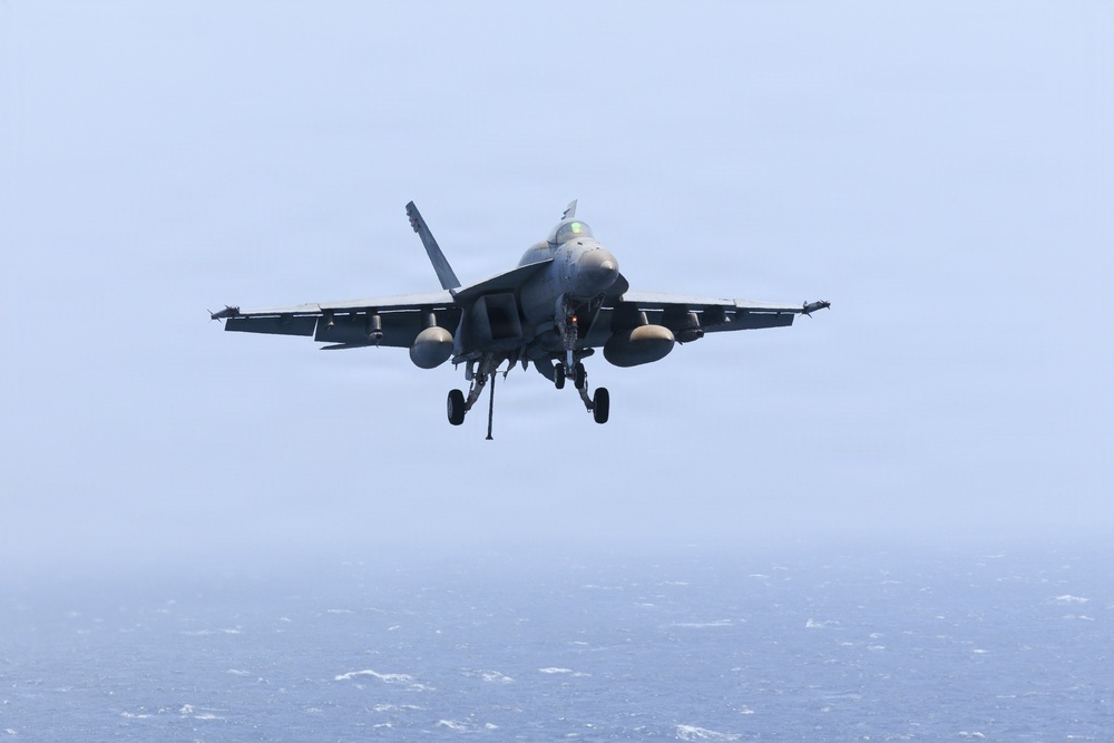 USS George H.W. Bush prepares to land aircraft