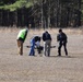 Technicians Prepare Large Multi-Rotor Drone for Flight Operations at Open Field Test Site