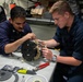 Midshipman participate in maintenance aboard USS Arlington (LPD 24)