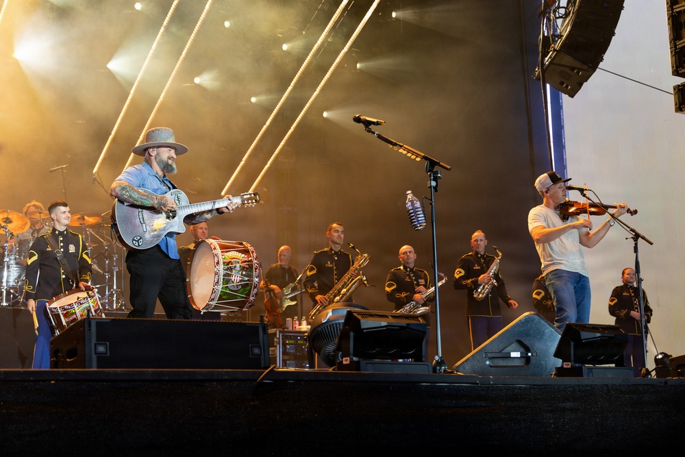 The U.S. Army Ceremonial Band performs with Zac Brown Band at Freedom 250 Fan Fest