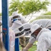 DM Airmen partner to safely relocate an Africanized bee colony