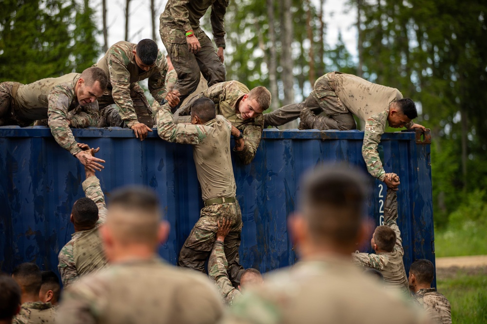 U.S., British, French soldiers participate in commemorative Bir Hakeim 10K mud race in Estonia