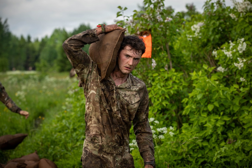 U.S., British, French soldiers participate in commemorative Bir Hakeim 10K mud race in Estonia