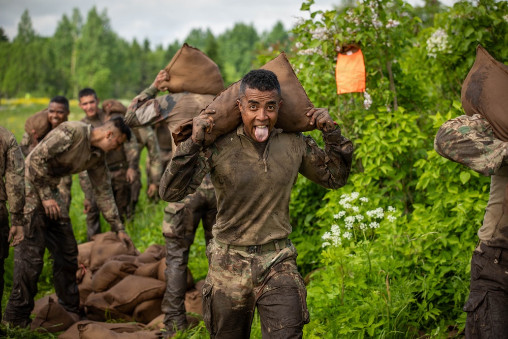 U.S., British, French soldiers participate in commemorative Bir Hakeim 10K mud race in Estonia